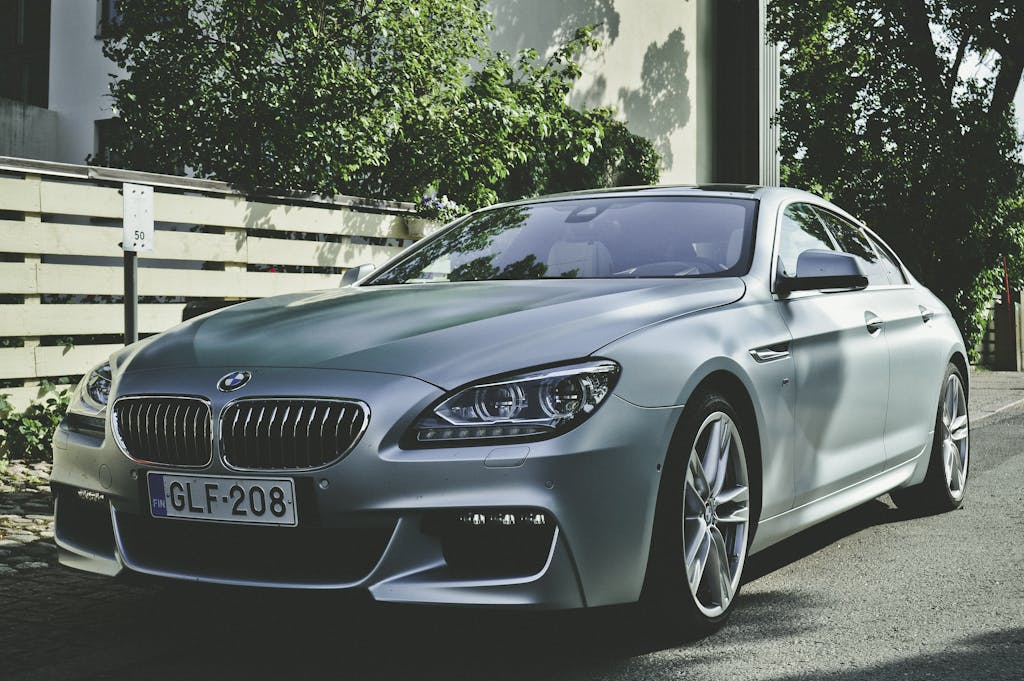 Sleek BMW sedan parked outdoors in Hamina, Finland, showcasing luxury automotive design.